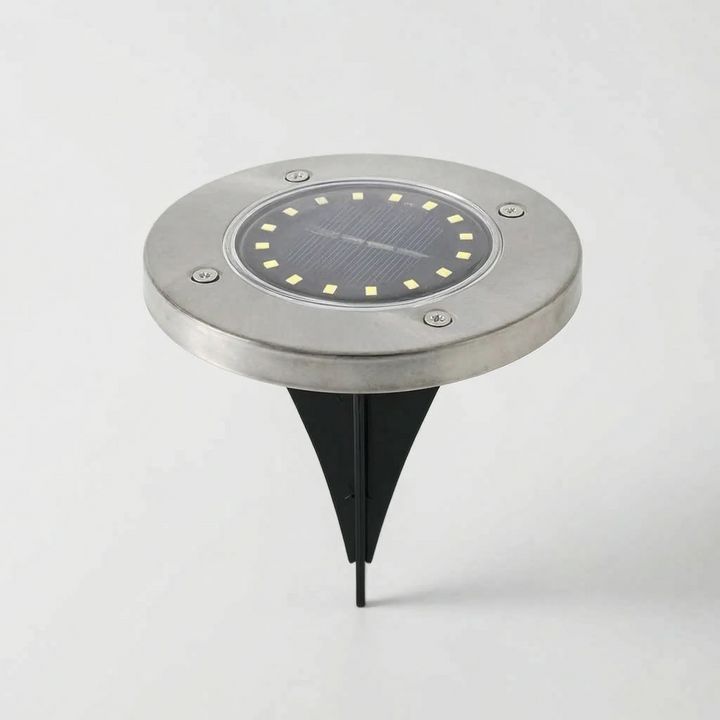Easy-install solar ground lights for garden and pathway. Durable, waterproof outdoor LED lighting.