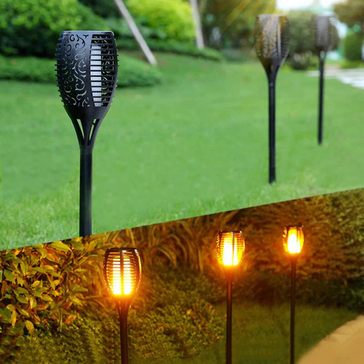 Outdoor solar LED garden torch, creating warm ambiance. Perfect waterproof pathway or landscape lighting.