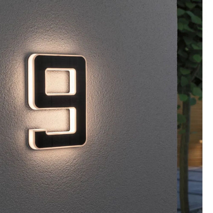 Durable outdoor solar LED house numbers, weatherproof for year-round illuminated address visibility.