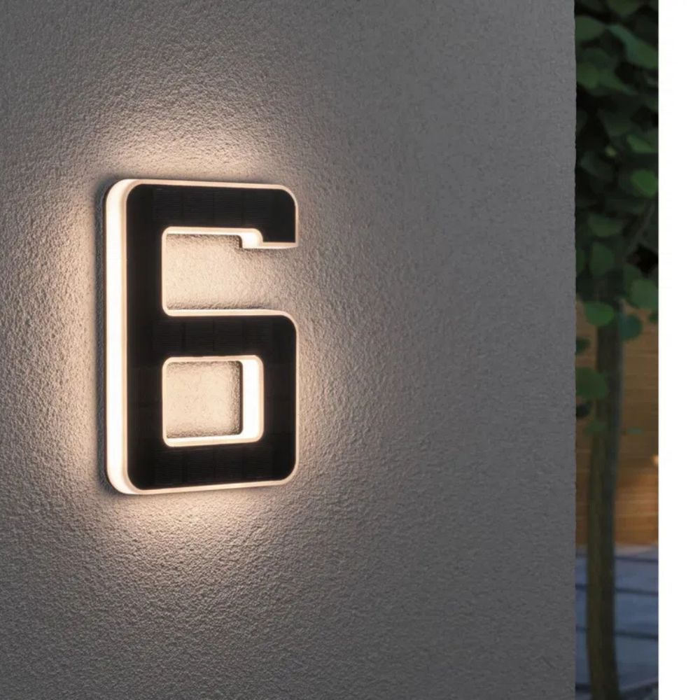 Illuminated house numbers powered by solar, providing bright, energy-efficient outdoor lighting.