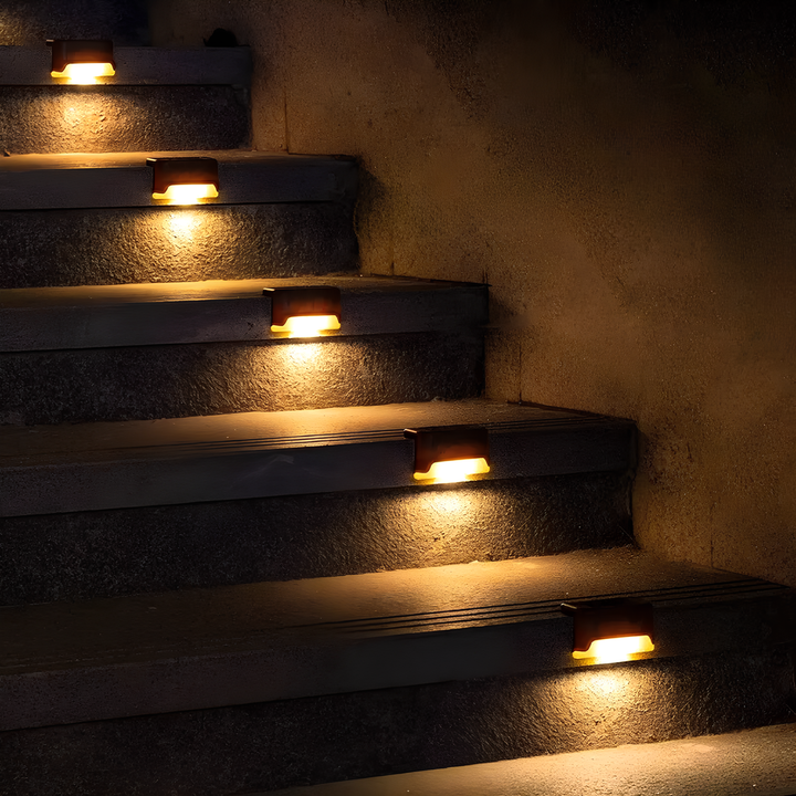 Night view of a pathway glowing with SoliStep Solar LED Step Lights, ensuring safe and beautiful outdoor decor