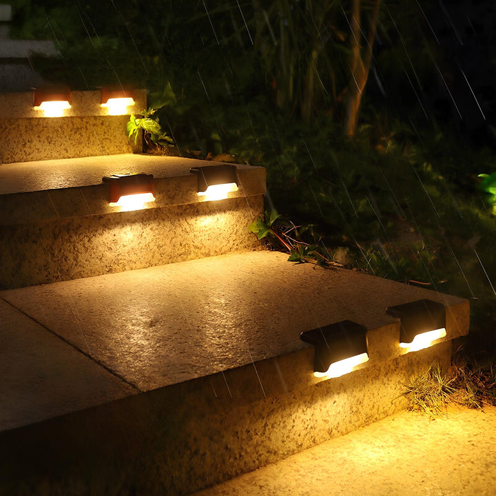 Row of SoliStep Solar LED Step Lights enhancing a modern outdoor staircase, elegant and functional