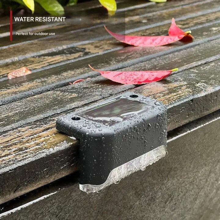 Top-down view of a SoliStep Outdoor Solar LED Step Light, demonstrating its wide light dispersion for pathways