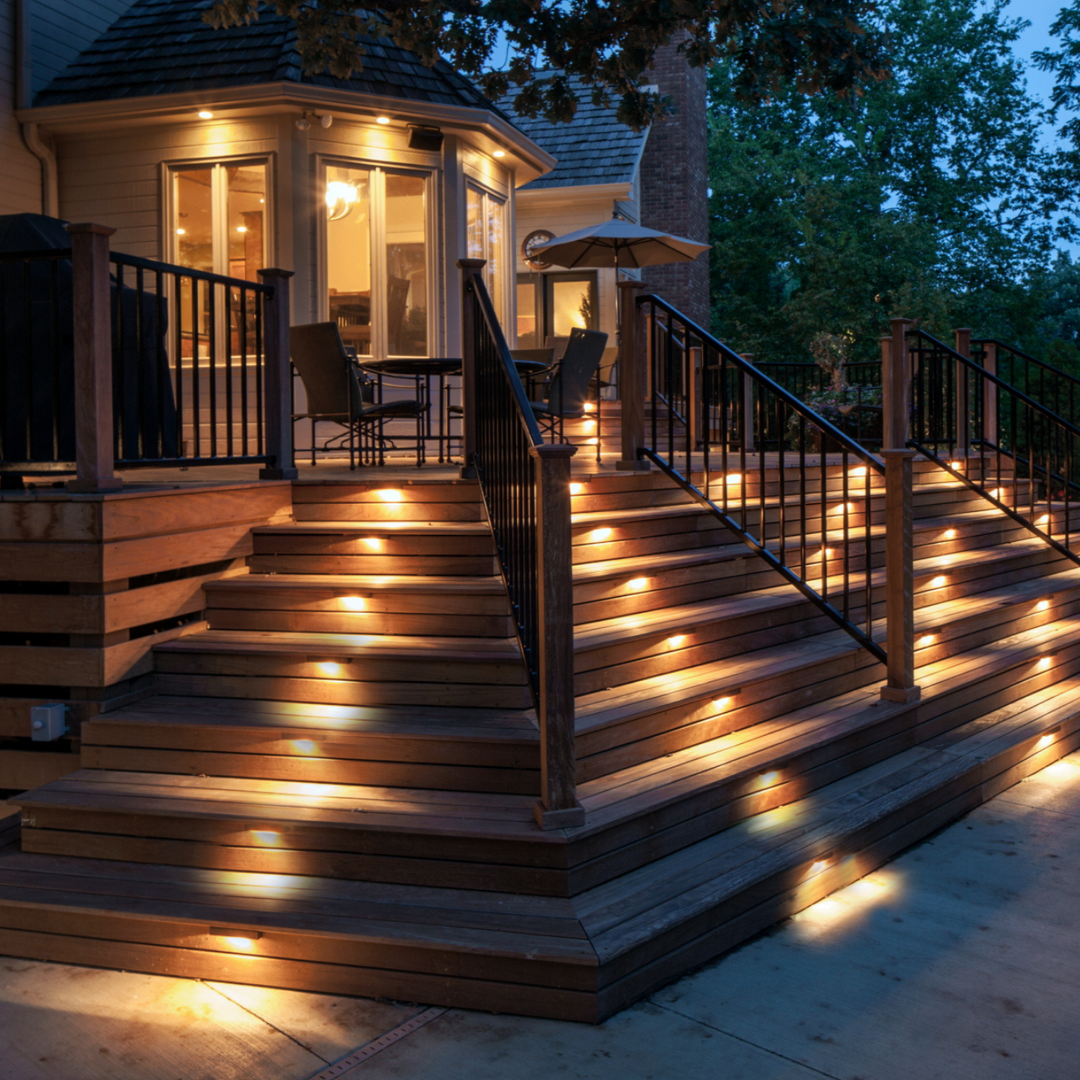 Close-up of a SoliStep Solar LED Step Light, showcasing its sleek design and bright illumination for pathways