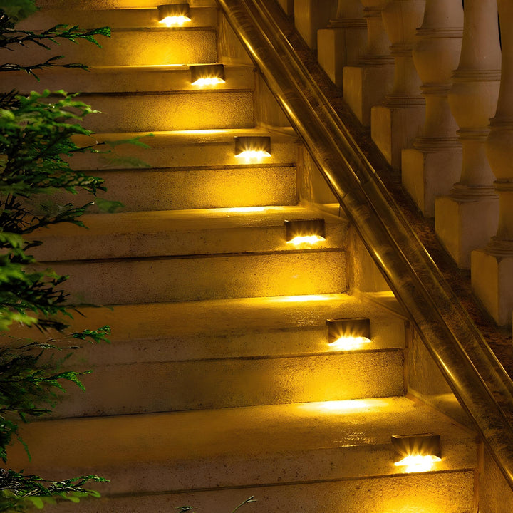 Pathway illuminated by multiple SoliStep Outdoor Solar LED Step Lights, enhancing safety and ambiance