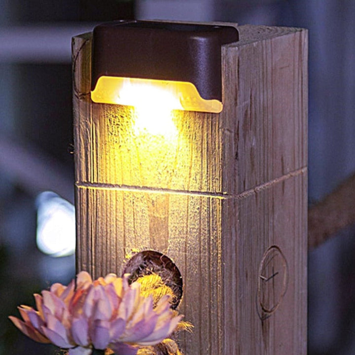 SoliStep Solar Step Light installed on a wooden deck, demonstrating easy energy-efficient outdoor lighting