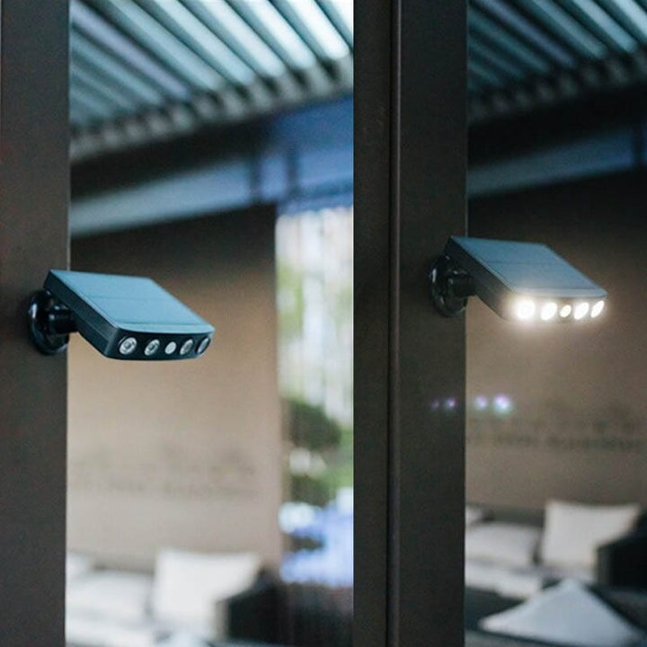 Energy-efficient solar wall light with integrated motion sensor, perfect for pathways & gardens