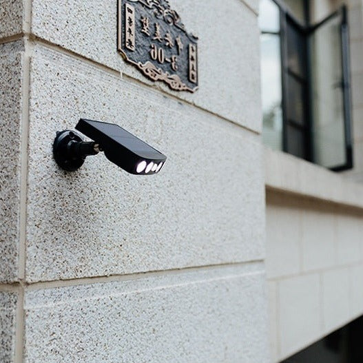 Lumina solar-powered wall light, providing bright LED illumination & motion detection for patios