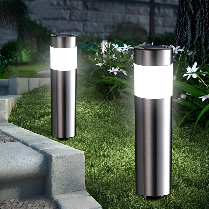 Decorative outdoor solar LED light, cylindrical stake for efficient garden illumination.