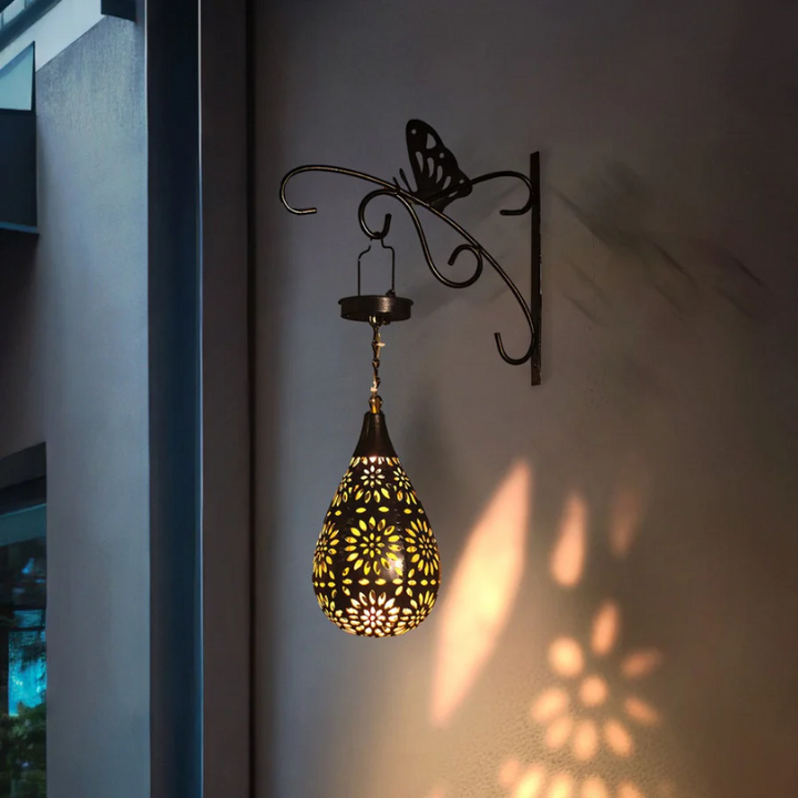 Stylish solar garden lantern, perfect for patio decor & outdoor ambiance lighting. Easy hang, eco-friendly.