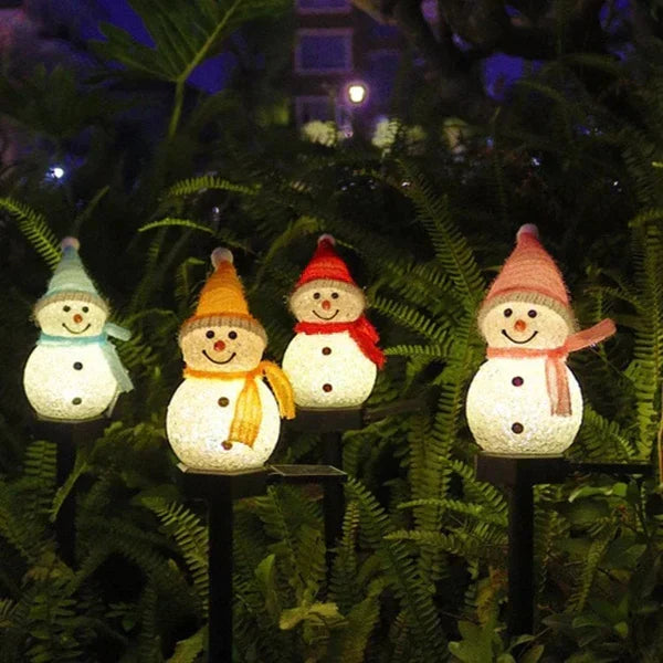 Outdoor solar snowman lamp for festive Christmas & holiday garden decor.