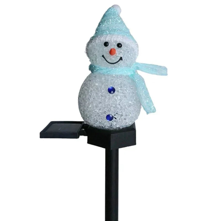Decorative solar snowman for outdoor Christmas decor, charming by day, glowing at night.