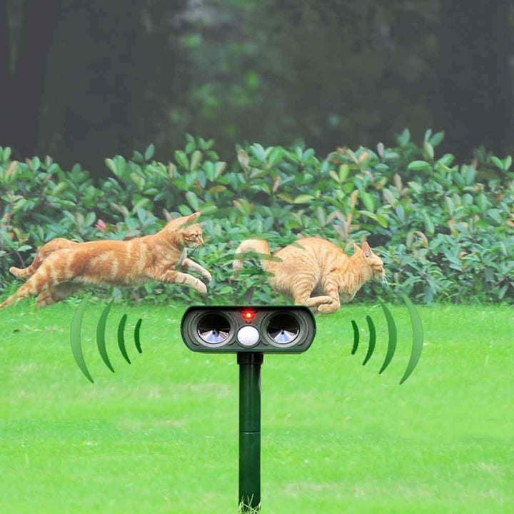 Keep Pests Away: Humane Outdoor Solar Ultrasonic Animal Repeller for Garden & Lawn.