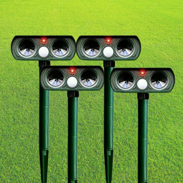 Outdoor solar ultrasonic animal repeller protecting gardens & yards with motion sensor technology.