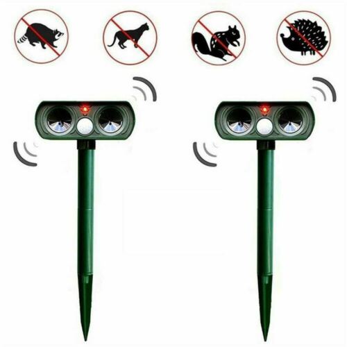 Close-up of solar ultrasonic animal repeller, showing motion sensor & solar panel for eco-friendly pest control.