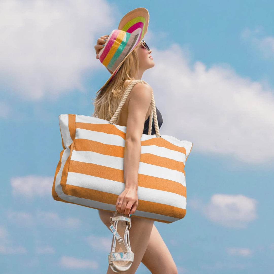 Oversized waterproof carry-all for beach days, keeps sand & water out.