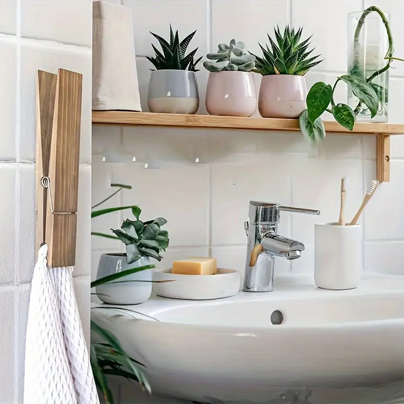 Minimalist wooden towel clamp set, sleek home decor for stylish and functional wall organization.