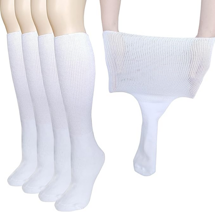 Pair of beige extra wide lymphedema & diabetic comfort socks, knee-high design for swollen feet support.