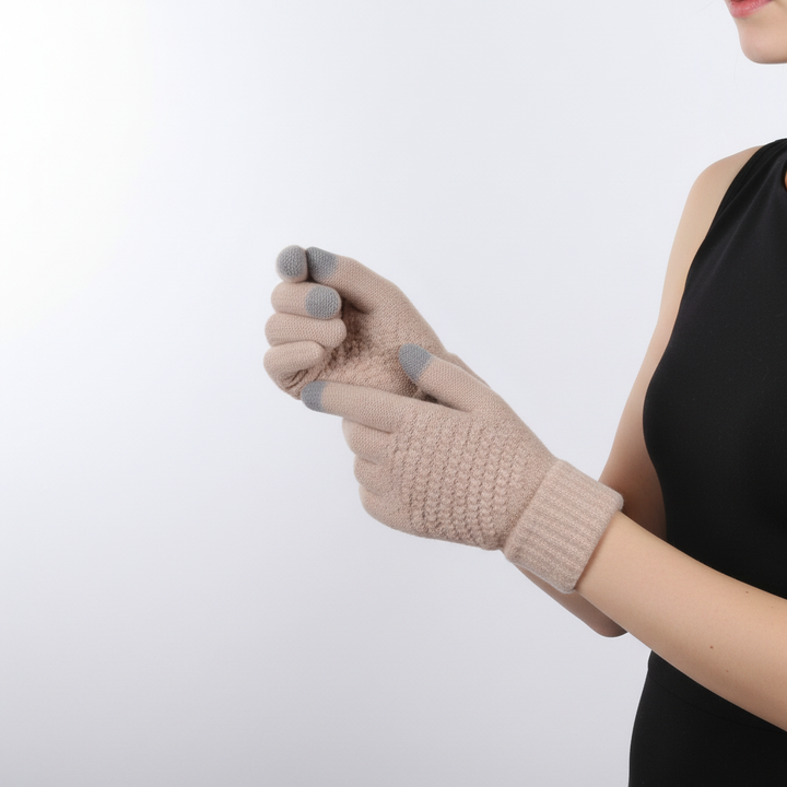A hand wearing a stylish knitted touchscreen glove interacting with a tablet, showcasing seamless tech integration.