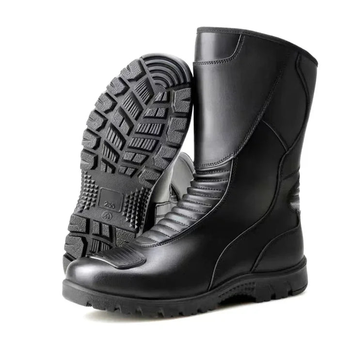 Pair of black unisex waterproof motorcycle touring boots with ankle protection, front view.