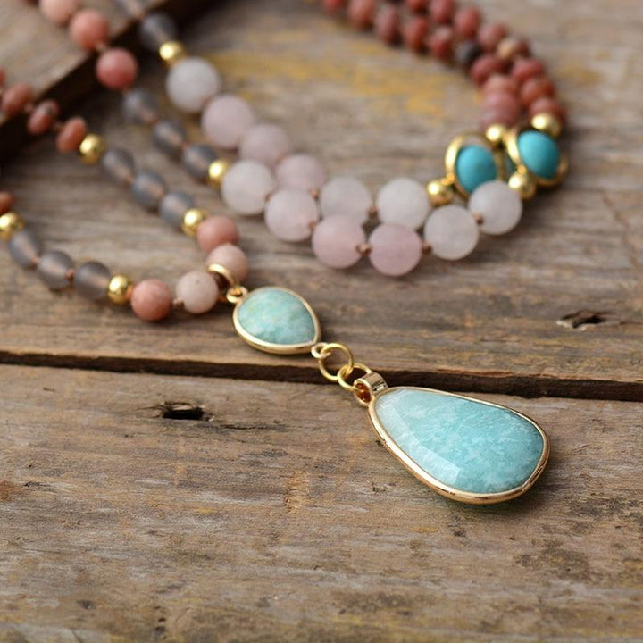 Pastel gemstone mala necklace for women, promoting peace & wellness with rose quartz, amazonite & jasper.