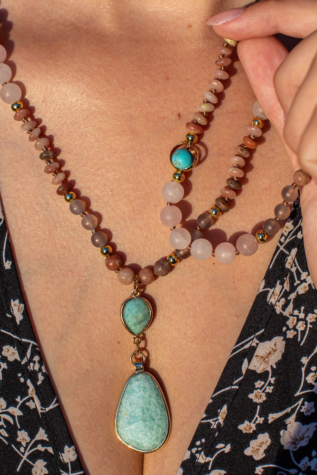 Women's healing pastel gemstone mala necklace featuring rose quartz, amazonite & onyx for meditation.