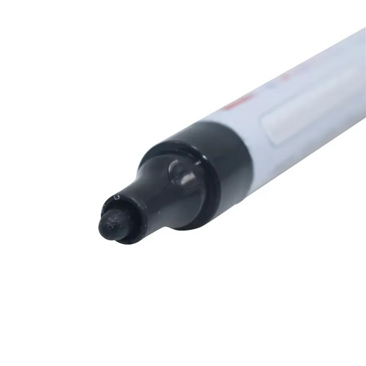 Permanent waterproof white car tire paint pen adding a custom detail to a car's tire for auto styling.