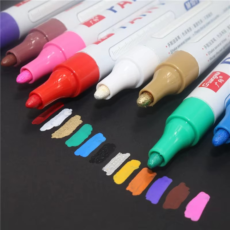 Assortment of colorful permanent waterproof car tire paint pens for custom wheel decoration & auto styling.