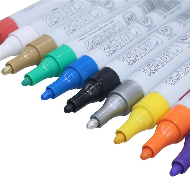 Durable permanent waterproof black tire paint pen creating long-lasting custom marks on car wheels.