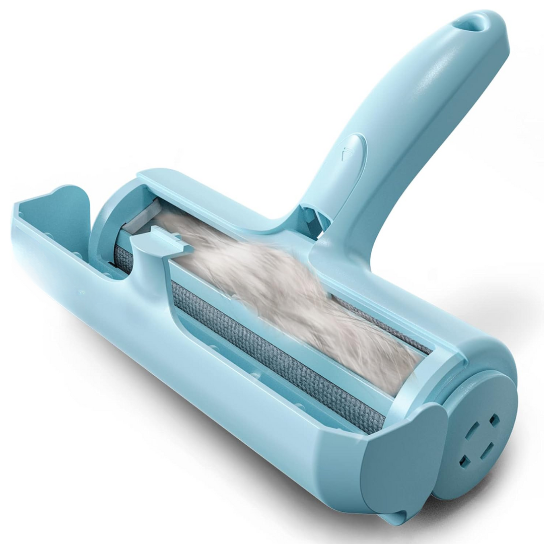 Efficient pet hair remover with red handle and white base, perfect for home cleaning dog and cat fur