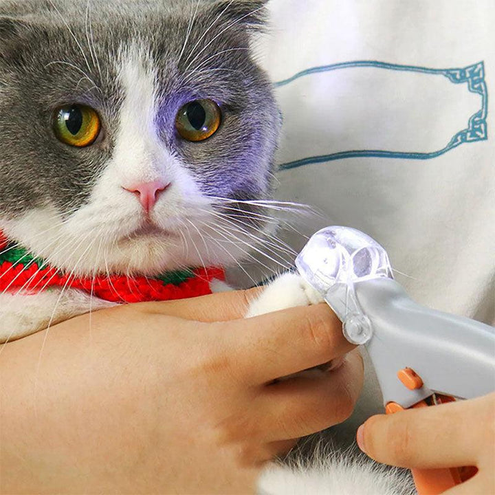 Ergonomic pet nail clippers with LED light & quick sensor for precise, stress-free dog and cat paw grooming at home.