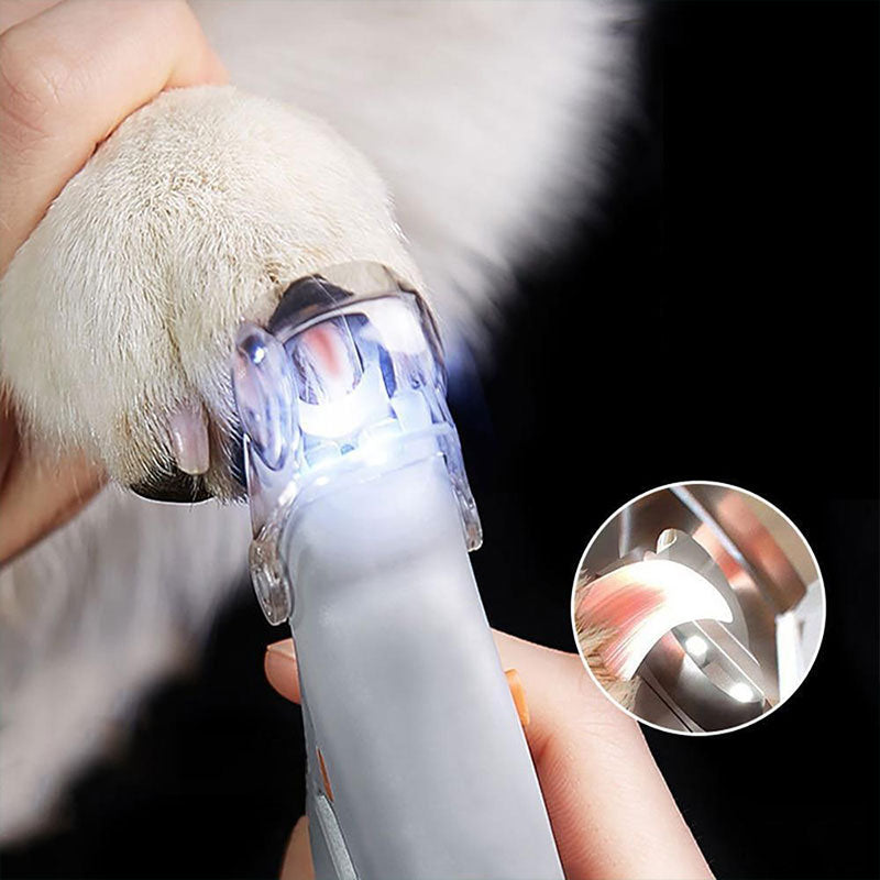 Ergonomic dog nail trimmer with quick sensor light. Ideal pet grooming tool for safe and easy nail care.
