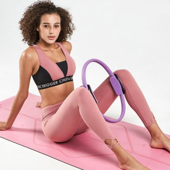 Pilates ring for core strength exercises, ideal for home workouts & muscle toning.