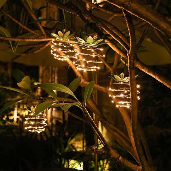 Tropical pineapple solar lamp, LED garden light. Perfect weatherproof outdoor decor for any patio.