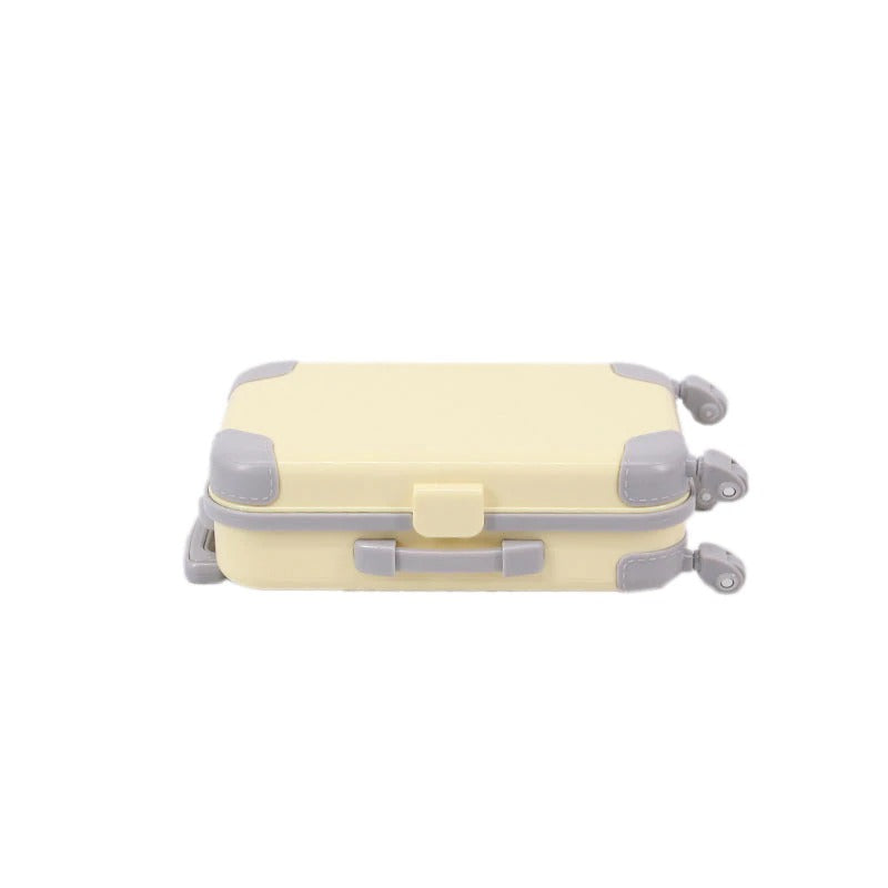 Miniature doll suitcase, durable design, for 18-inch dolls; ultimate kids' toy for travel stories.