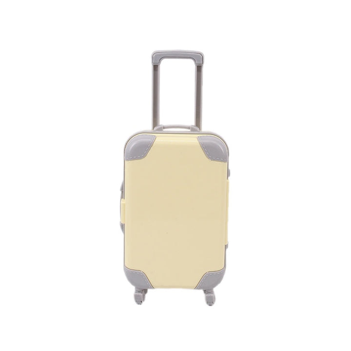 Doll travel suitcase beside an 18-inch doll; perfect kids' toy for adventures, pretend play accessory.