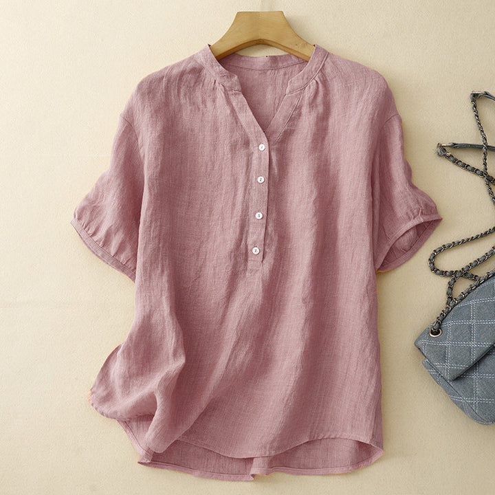 Pink flowy V-neck blouse for women, perfect for a stylish and effortless casual look.