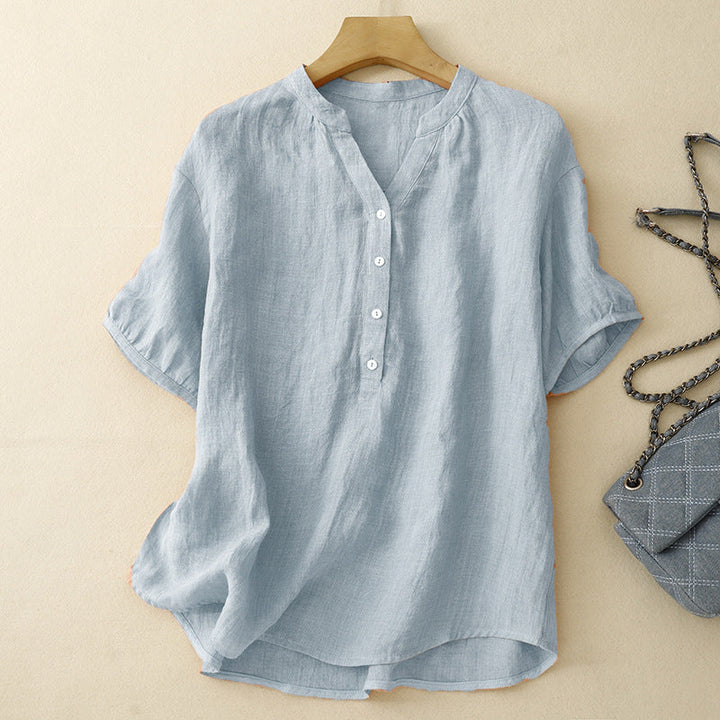 Women's blue flowy V-neck long sleeve blouse, a stylish summer top for casual elegance.