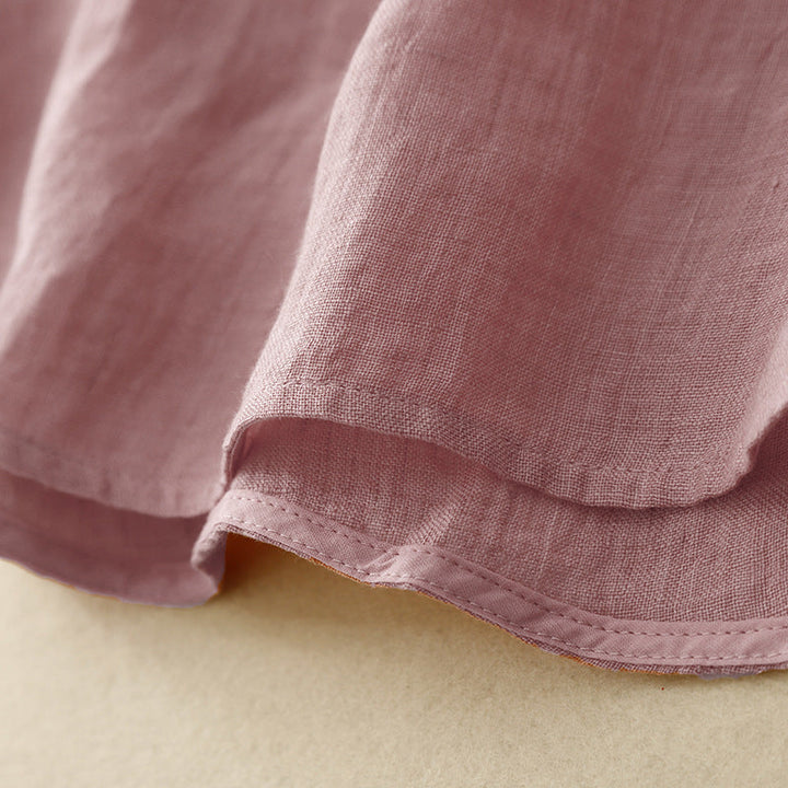 Stylish women's flowy V-neck blouse, a versatile long sleeve top for casual or dressy occasions.