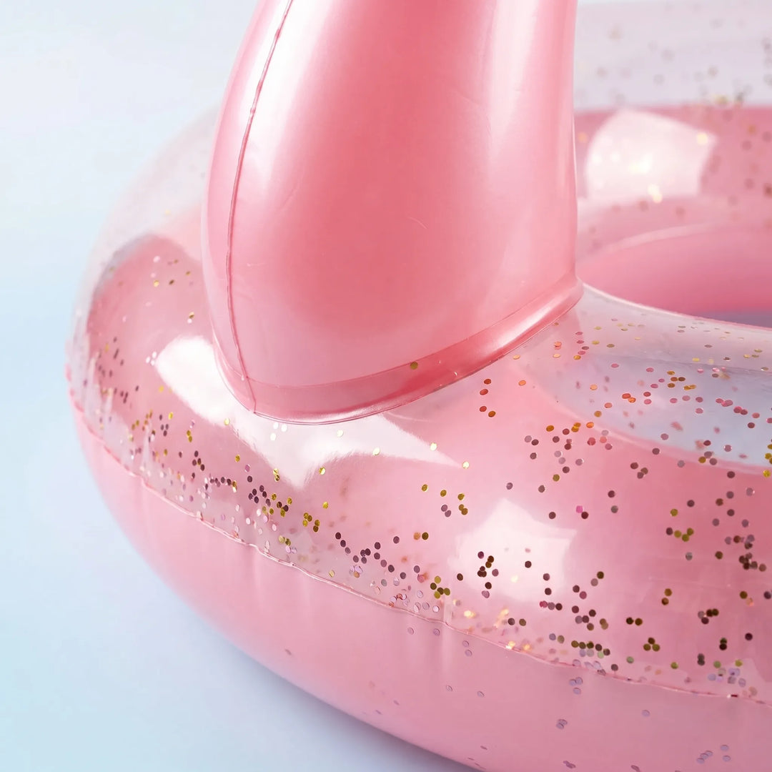 Large pink flamingo pool float, ideal for relaxing summer days, beach trips, and vibrant pool parties.