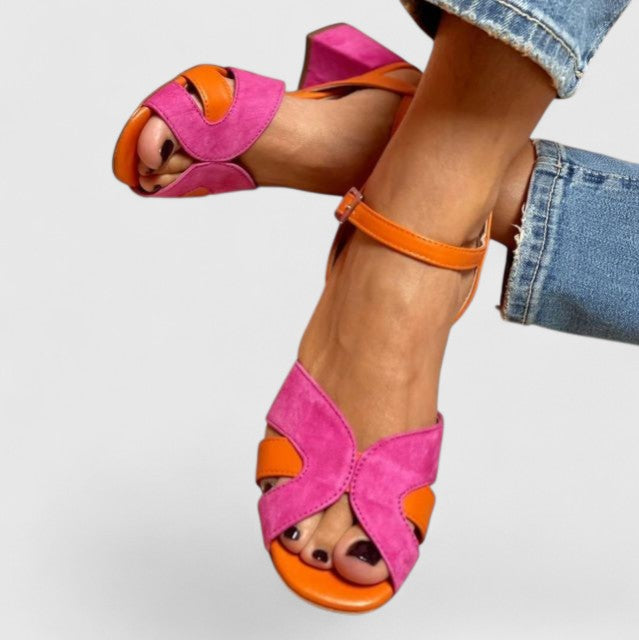 Comfortable pink summer wedge heel sandals for women, featuring a stylish design and adjustable strap for casual wear.