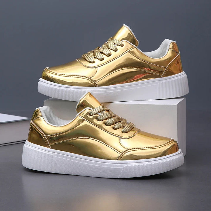 Pink women's glossy lace-up fashion sneakers, comfortable and trendy casual footwear for everyday wear.