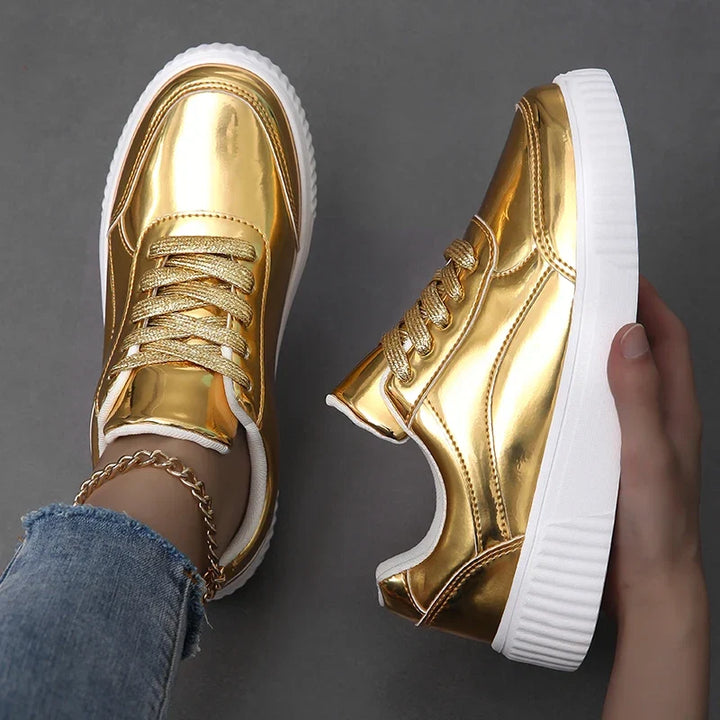 Comfortable pink glossy lace-up sneakers for women, versatile and fashionable casual footwear.