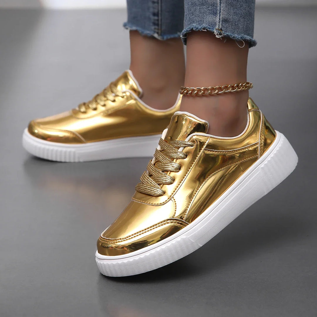 Glossy pink women's sneakers with lace-up design, ultimate comfortable and trendy casual footwear.