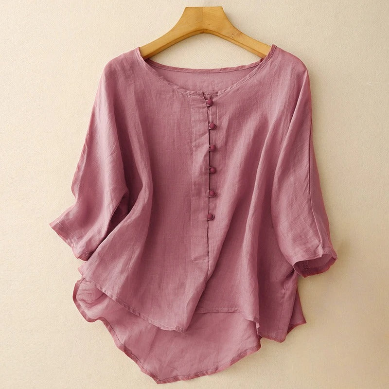 Pink women's lightweight flowy blouse with a round neck and button-front, perfect for elegant everyday wear.