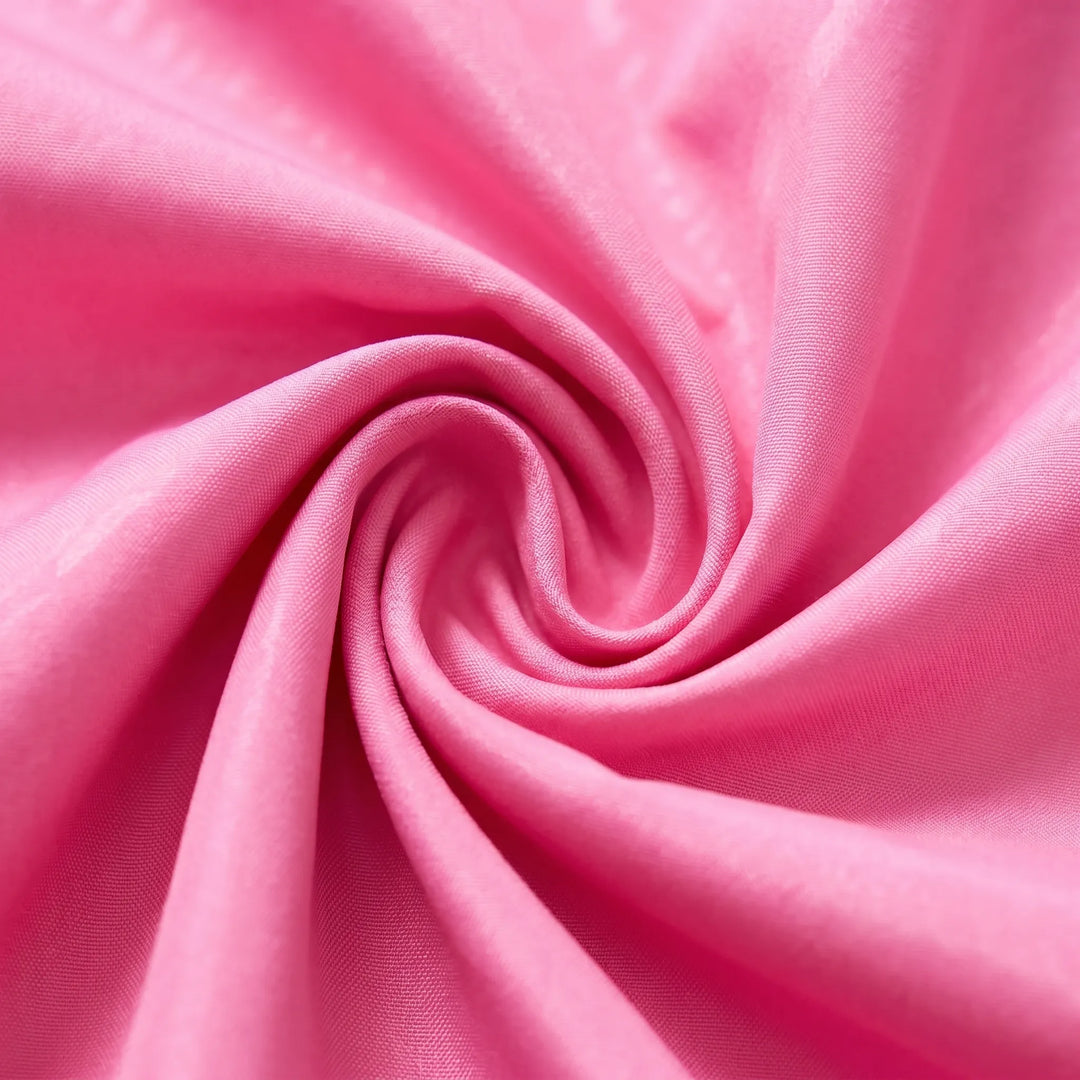 Blue women's hooded lightweight travel jacket, easily packable and perfect for active outdoor adventures and hiking.