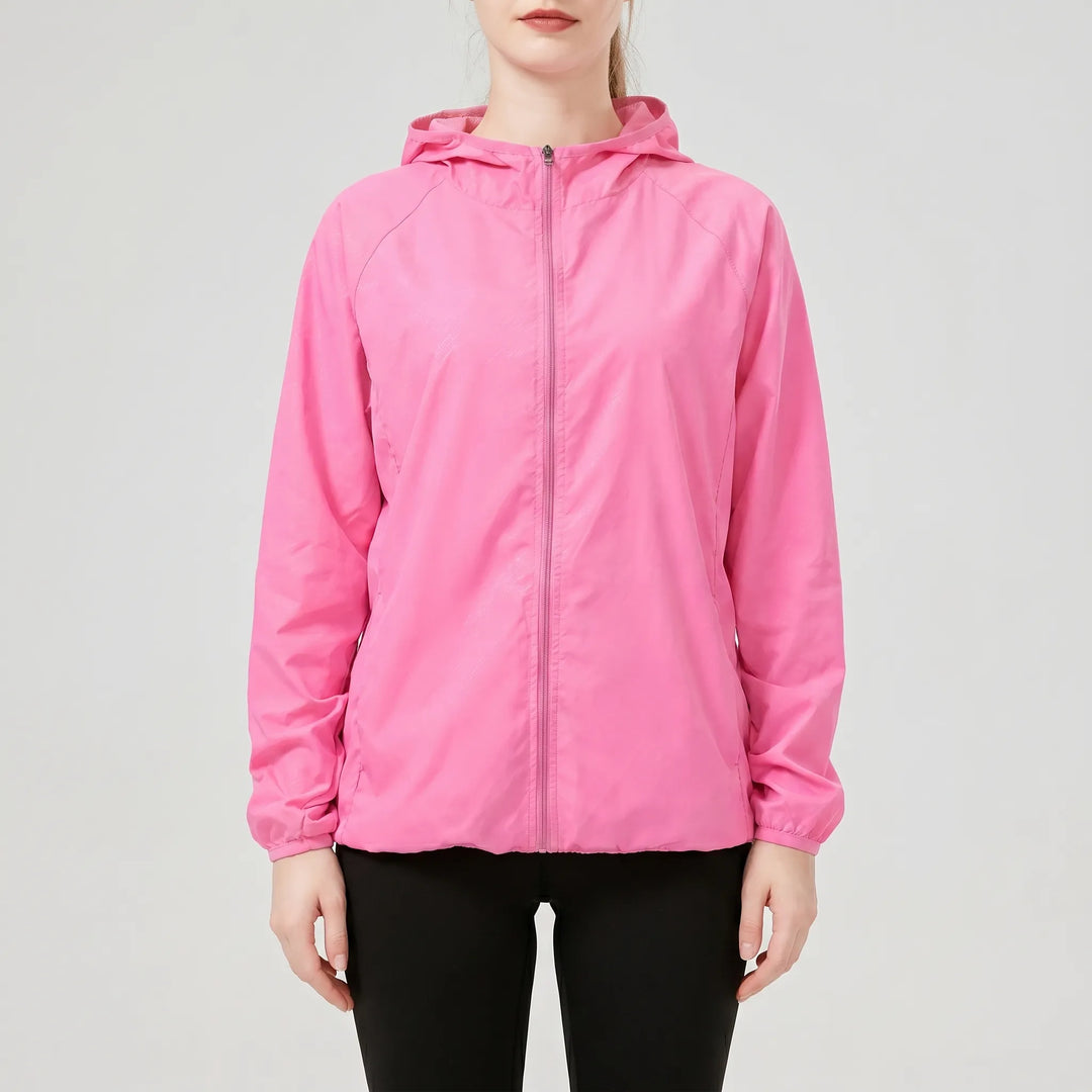 White women's lightweight hooded hiking jacket, an active outdoor windbreaker & packable rain jacket for women.