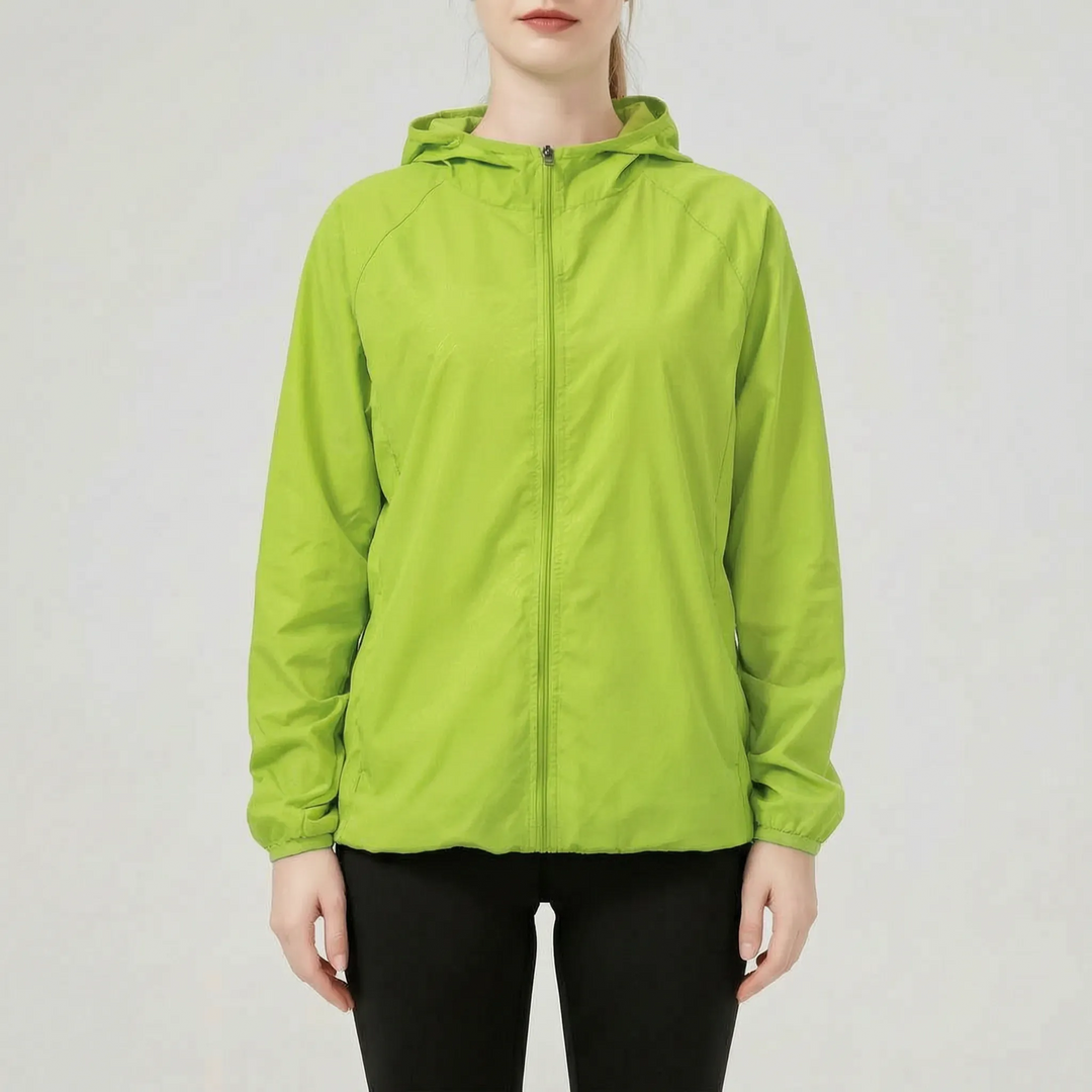 Orange women's versatile lightweight hooded jacket, an active windbreaker & rain jacket for hiking and travel.