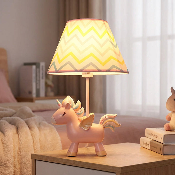 Playful unicorn table lamp with rainbow mane, perfect as a kids' night light or nursery decor