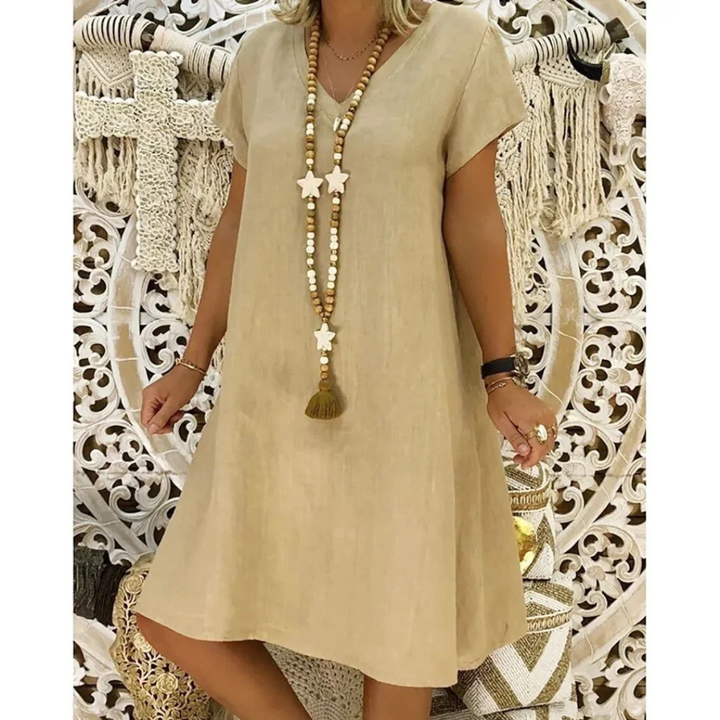 Plus size flowy casual summer dress for women, comfortable relaxed fit for everyday wear.